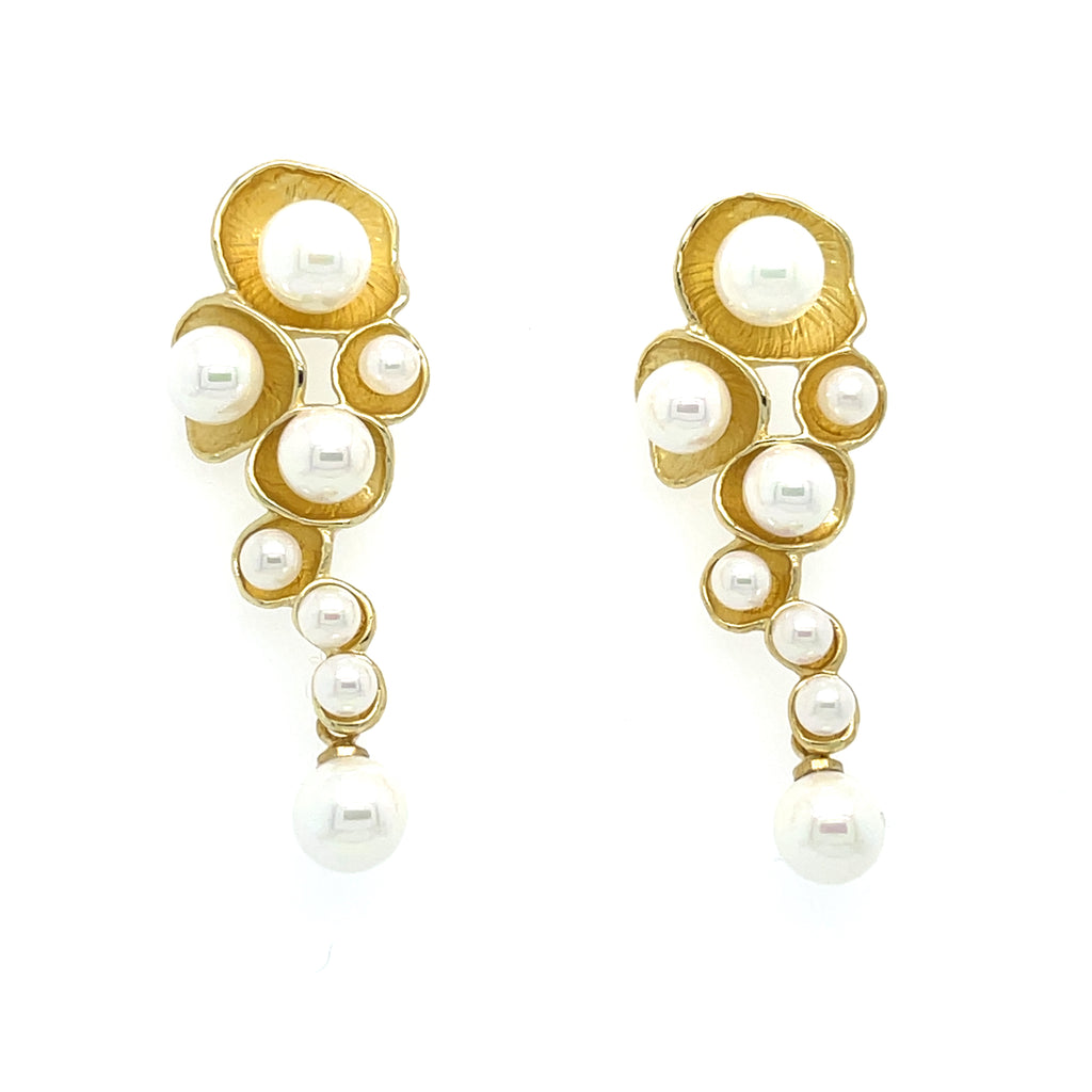 18k gold plated brass earrings. Each earring is handmade around each pearl.