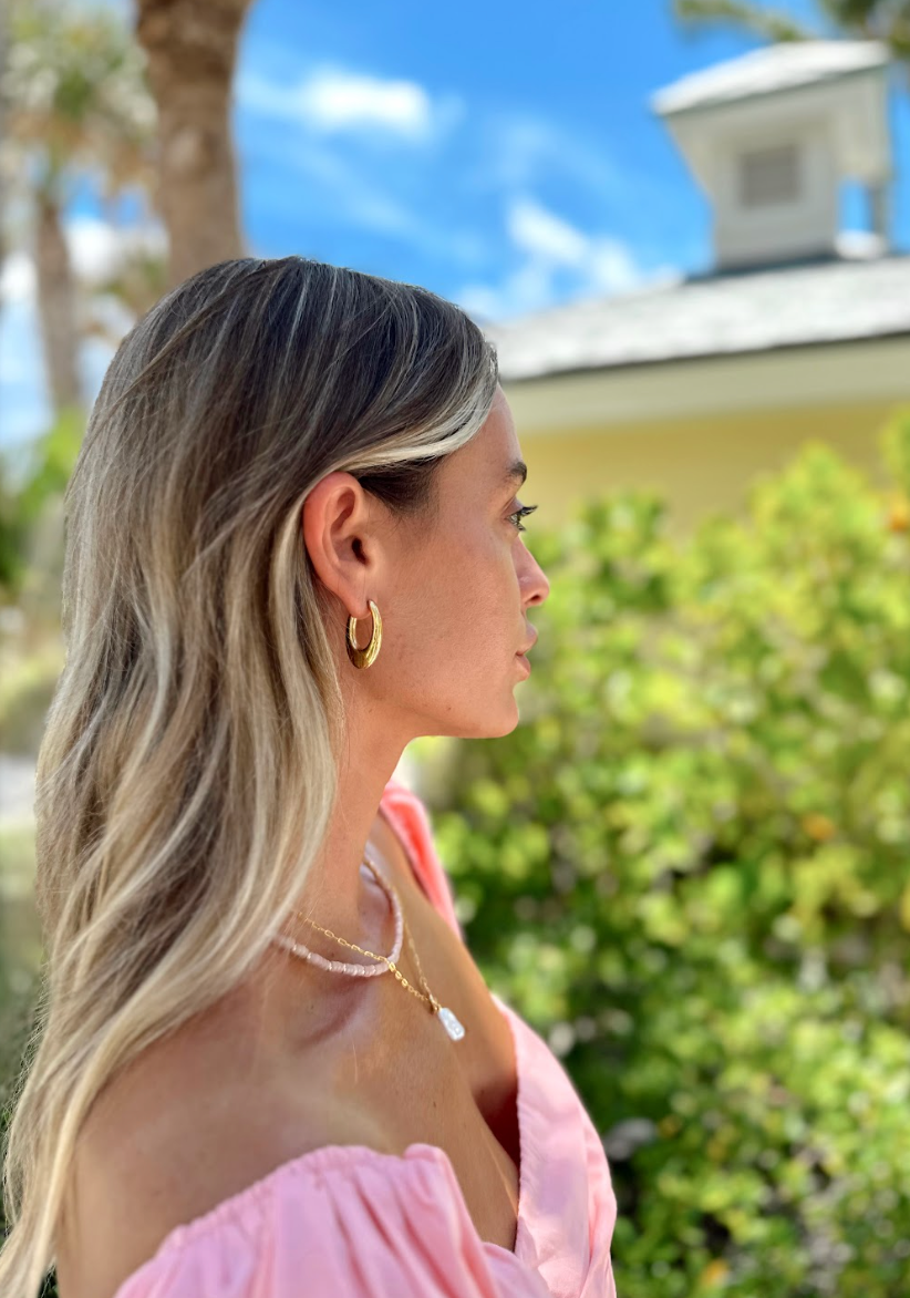 Elegant 1x3/4 inch oval-shaped earrings crafted in gold plated stainless steel for lasting shine.
Chic and timeless accessory ideal for casual, office, or evening looks.