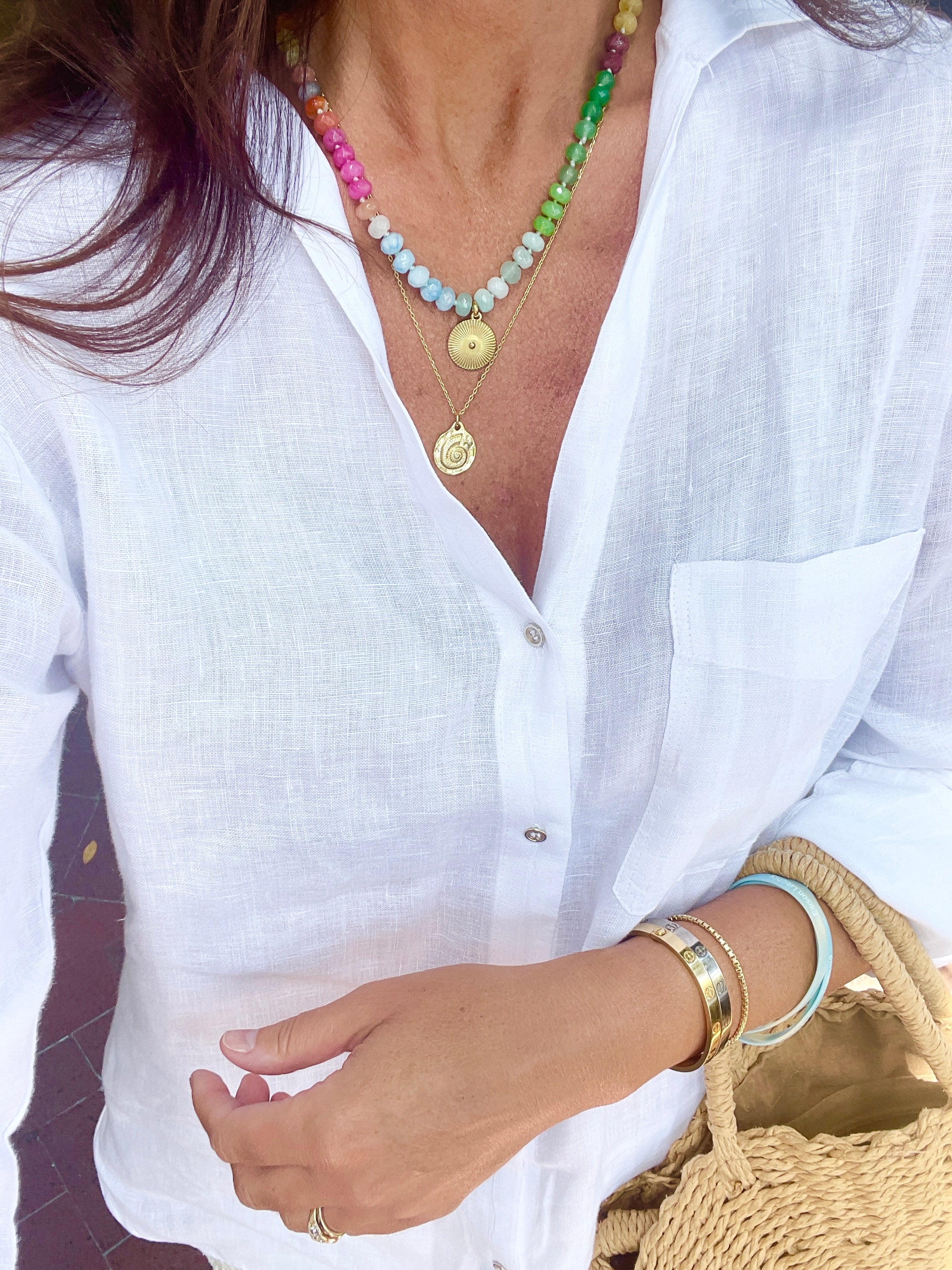 Elegant 18k gold plated nautilus pendant necklace with 5/8 inch charm on 18-inch chain + 2.5-inch extender.
Ocean-inspired stainless steel jewelry—perfect for layering or statement styling.