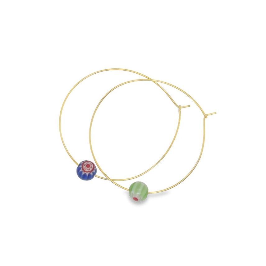 Gold hoop earrings with colorful millefiori beads on a white background