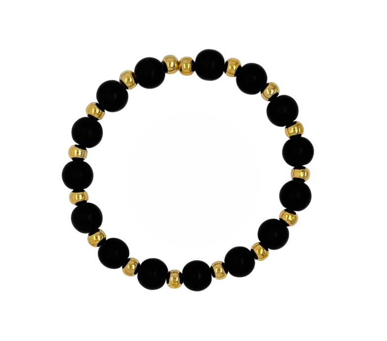 A beaded stretch bracelet featuring matte black round beads alternating with small polished gold spacer beads, shown against a plain white background.