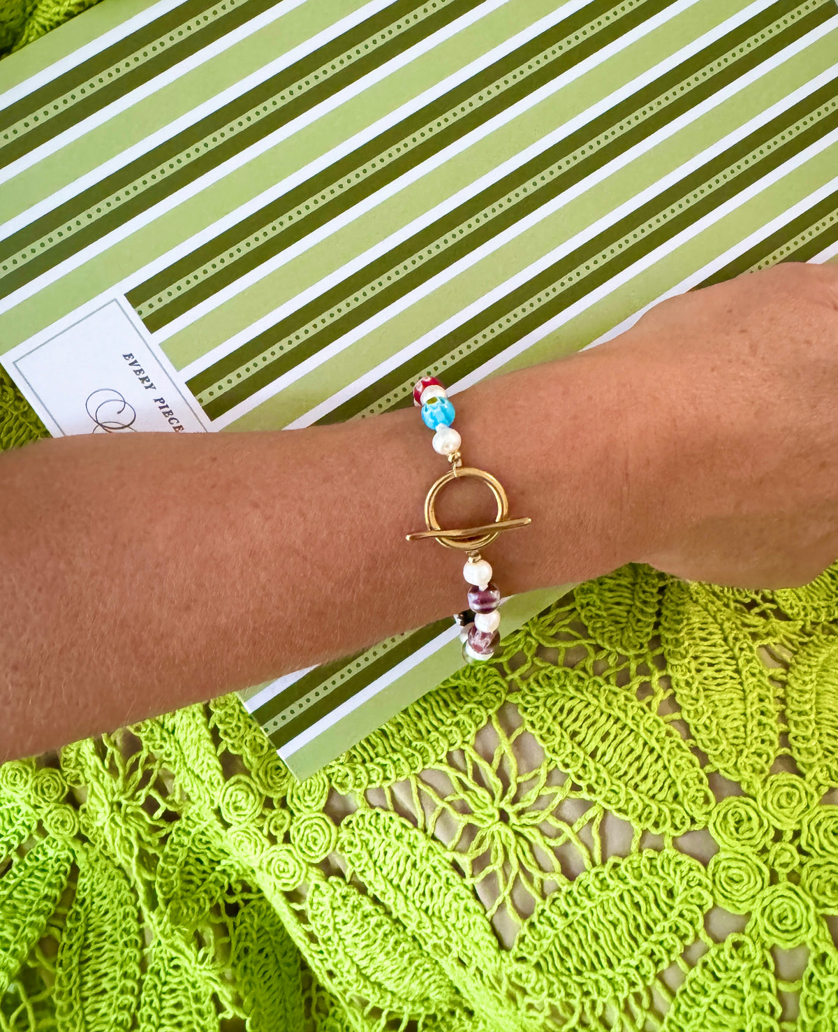 This new unique piece features European-style beads mixed with marvelous pearls. The unique clasp offers an alternative option to a traditional clasp. 