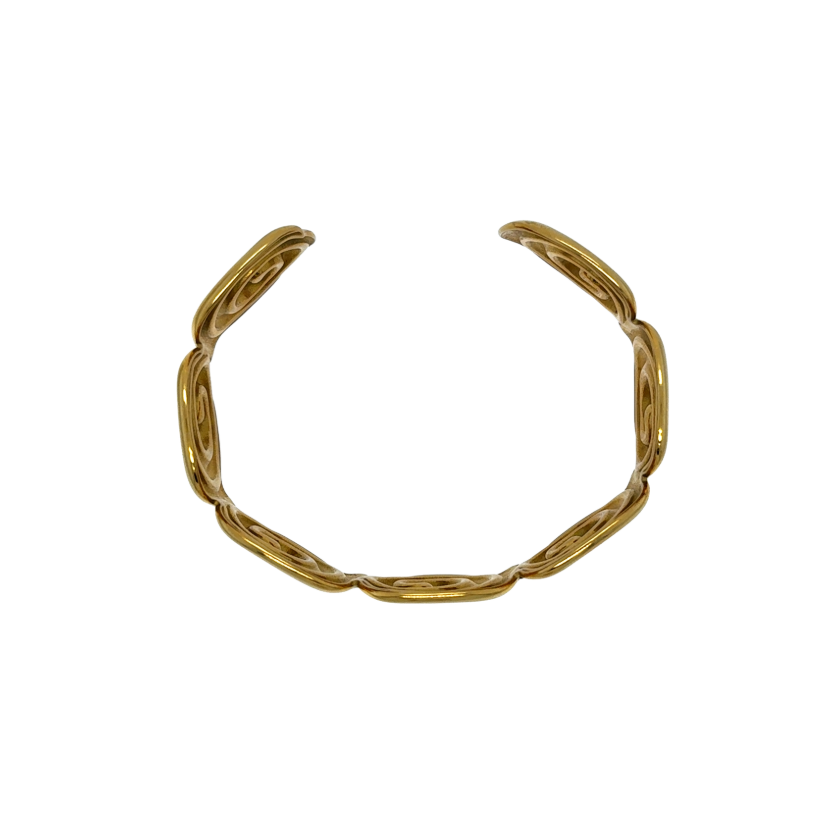 Gold bracelet on a white background