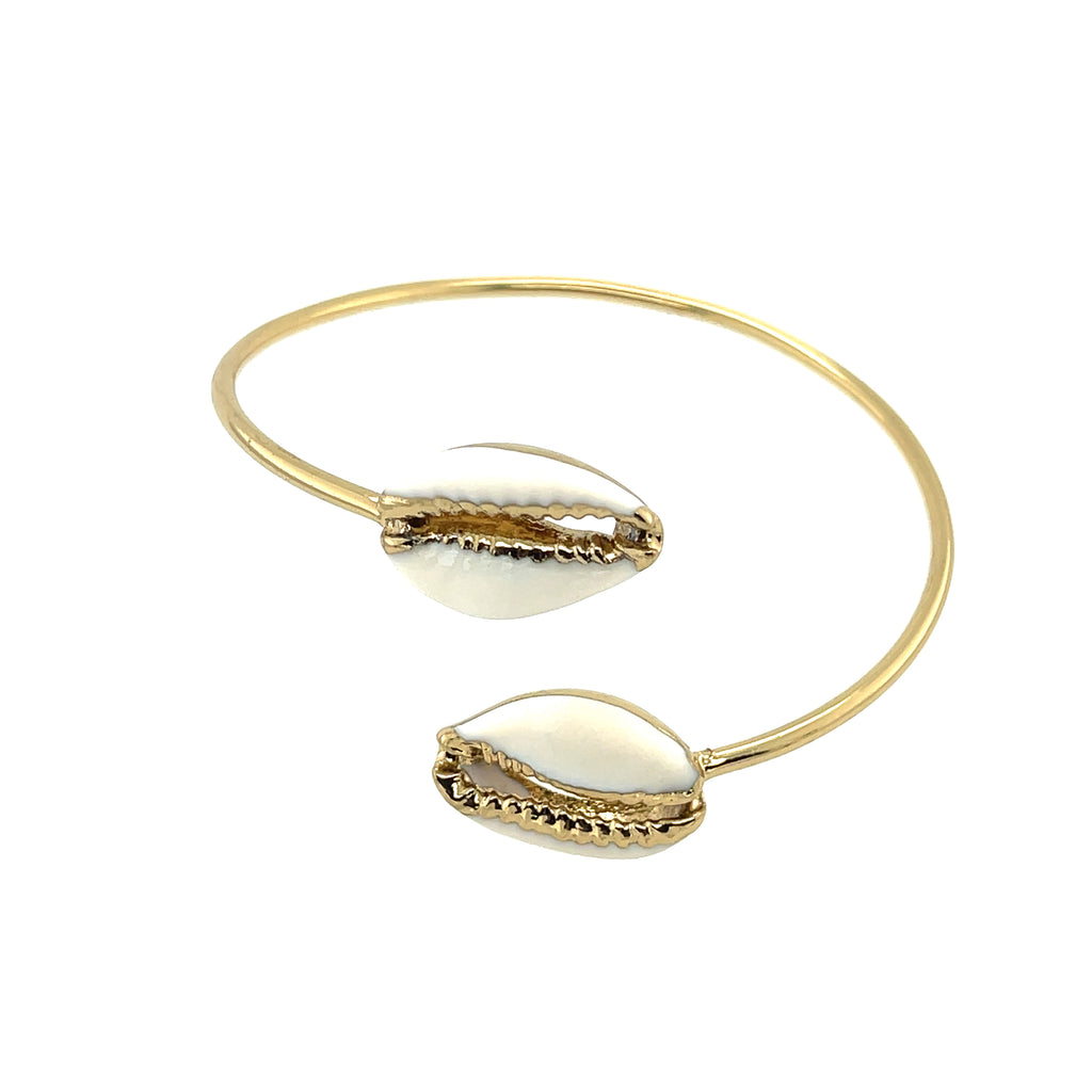 Gold plated bangle with cowrie shells on the ends. 7.5 in diameter.