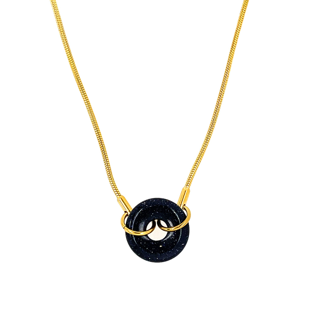 Elegant 18-inch gold-plated chain featuring a dazzling stone pendant, perfect for elevating any outfit. 