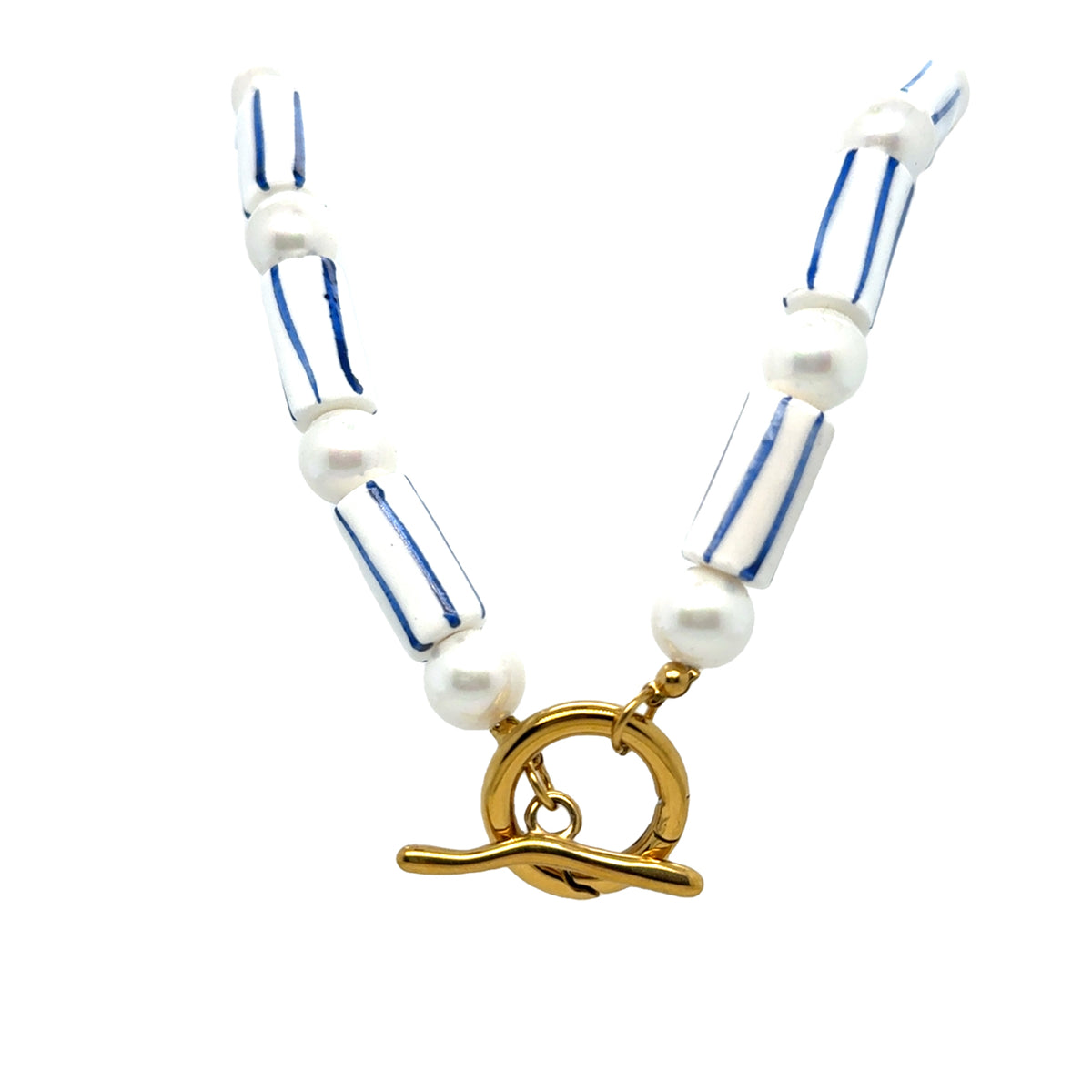 A striped blue and white bead and pearl necklace with a gold-tone loop and bead details.