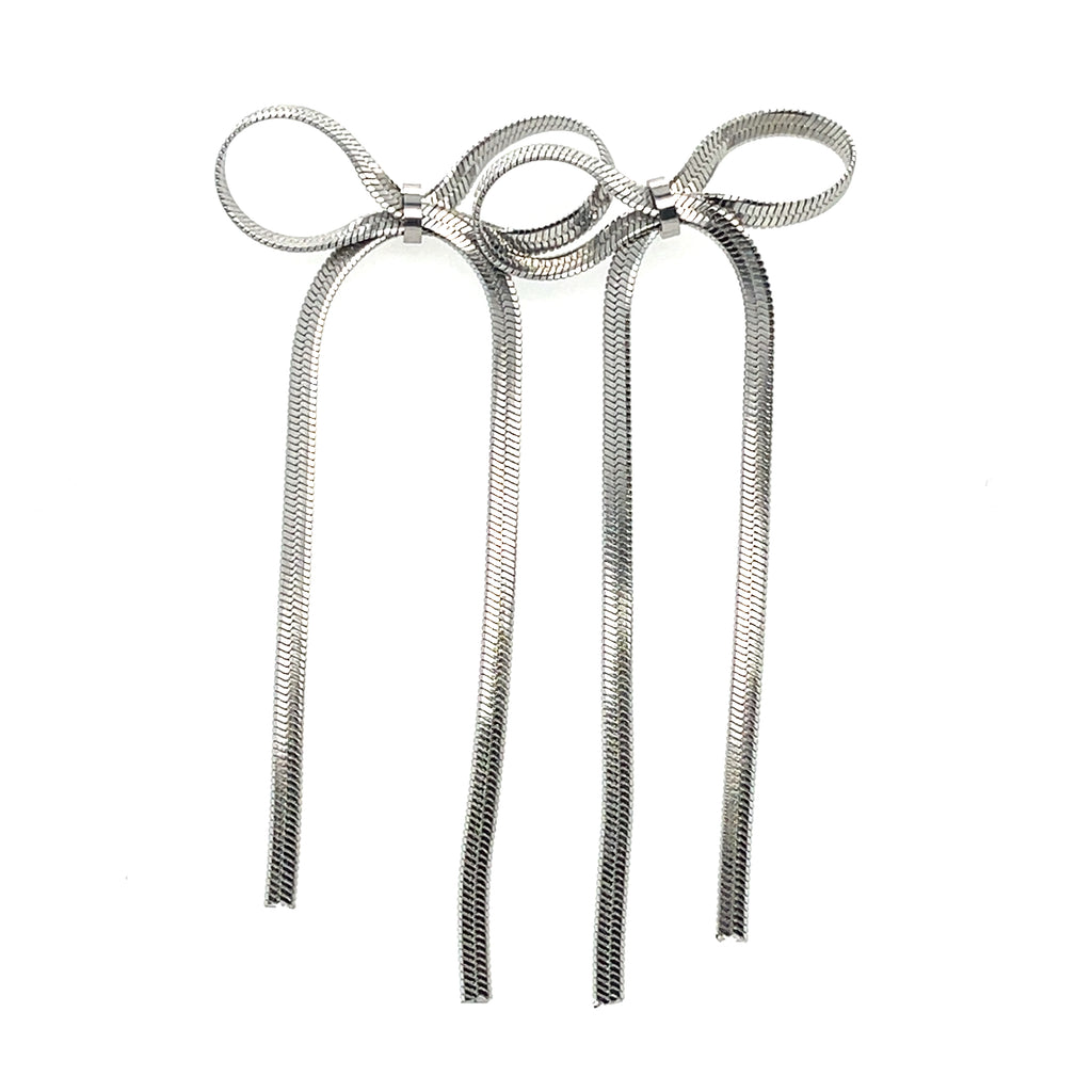 Glamorous 3.5-inch rhodium plated bow tie earrings with high-shine finish for bold elegance.
Perfect statement accessory for evening wear, parties, or formal occasions.