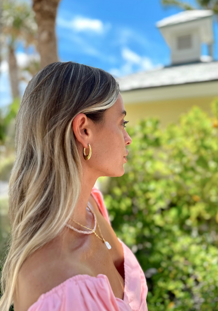 Elegant 1x3/4 inch oval-shaped earrings crafted in gold plated stainless steel for lasting shine.
Chic and timeless accessory ideal for casual, office, or evening looks.