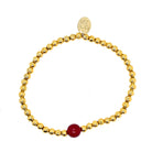 Gold-plated stainless steel bracelet with 4mm beads and a January Garnet birthstone center – elegant personalized jewelry for women