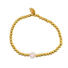 October Pink Tourmaline birthstone bracelet featuring 4mm gold-plated stainless steel beads – feminine personalized jewelry