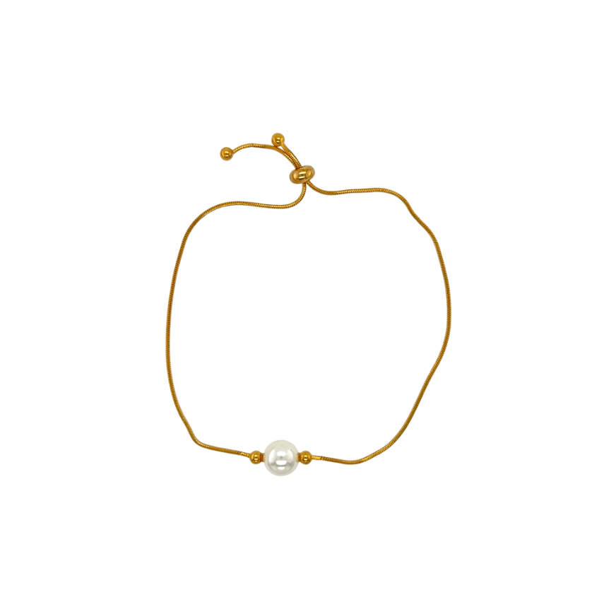 Gold bracelet with a pearl on a white background
