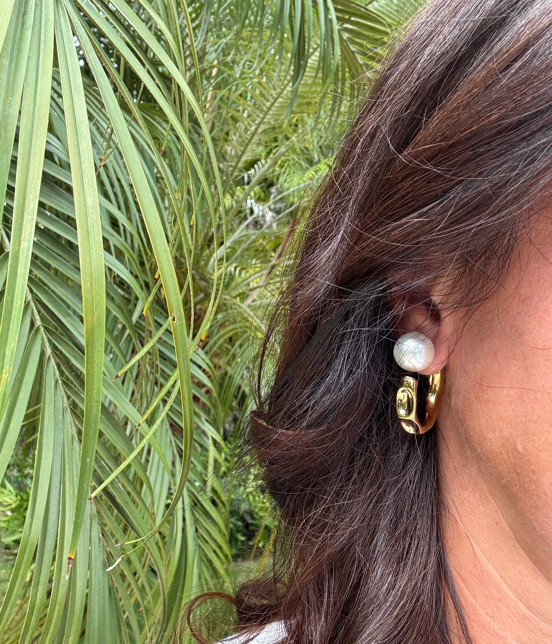 Small 1-inch gold hoop earrings in stainless steel – durable minimalist design for casual and formal looks.