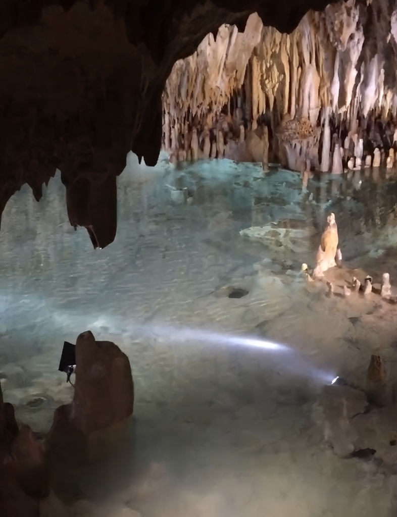Explore the Cayman Crystal Caves, a stunning underground world of stalactites and natural beauty.