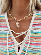 16 inch 14K gold finished link chain necklace with 1 inch seashell pendant.