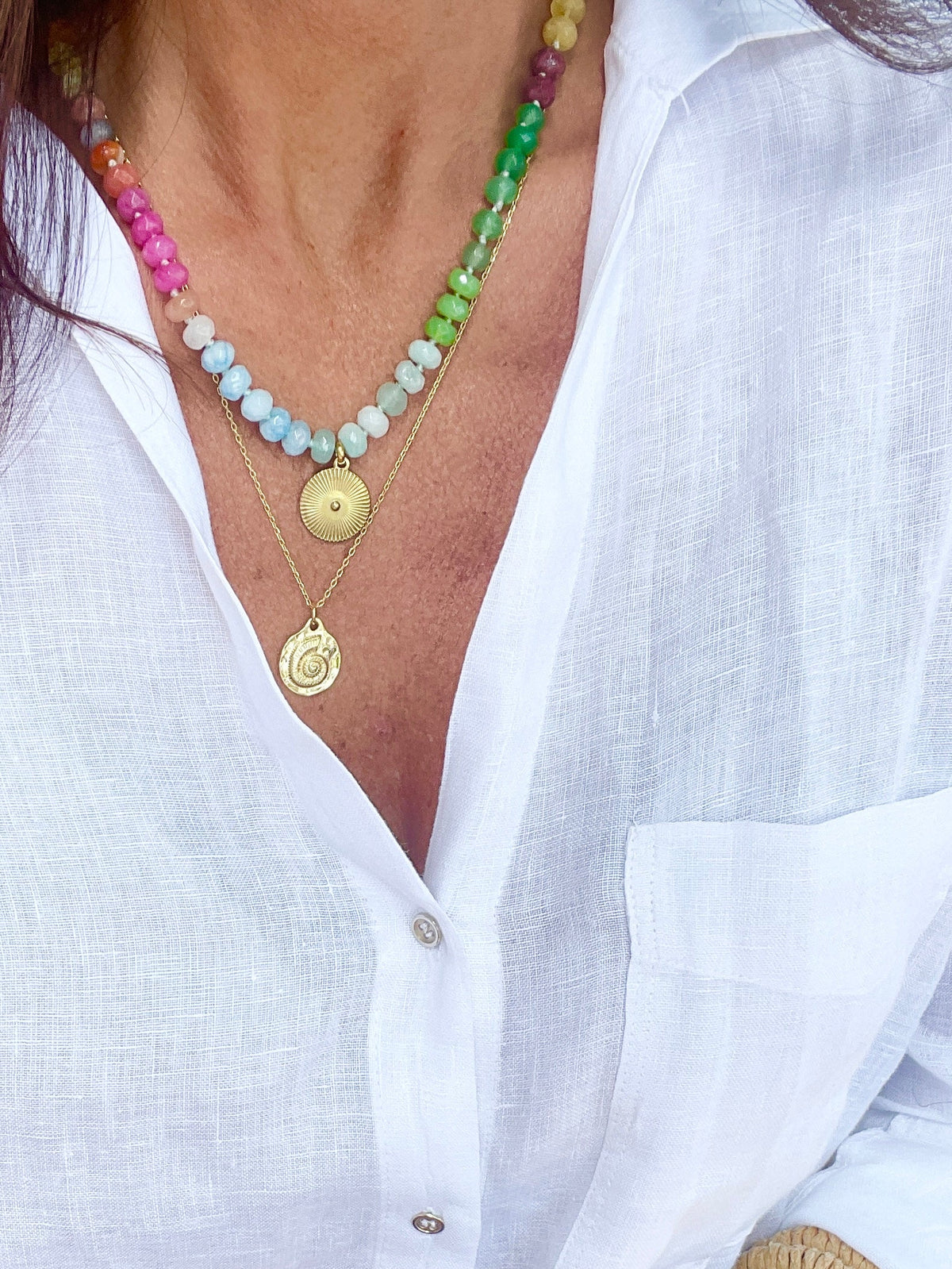 Elegant 18k gold finished nautilus pendant necklace with 5/8 inch charm on 18-inch chain + 2.5-inch extender.
Ocean-inspired stainless steel jewelry—perfect for layering or statement styling.