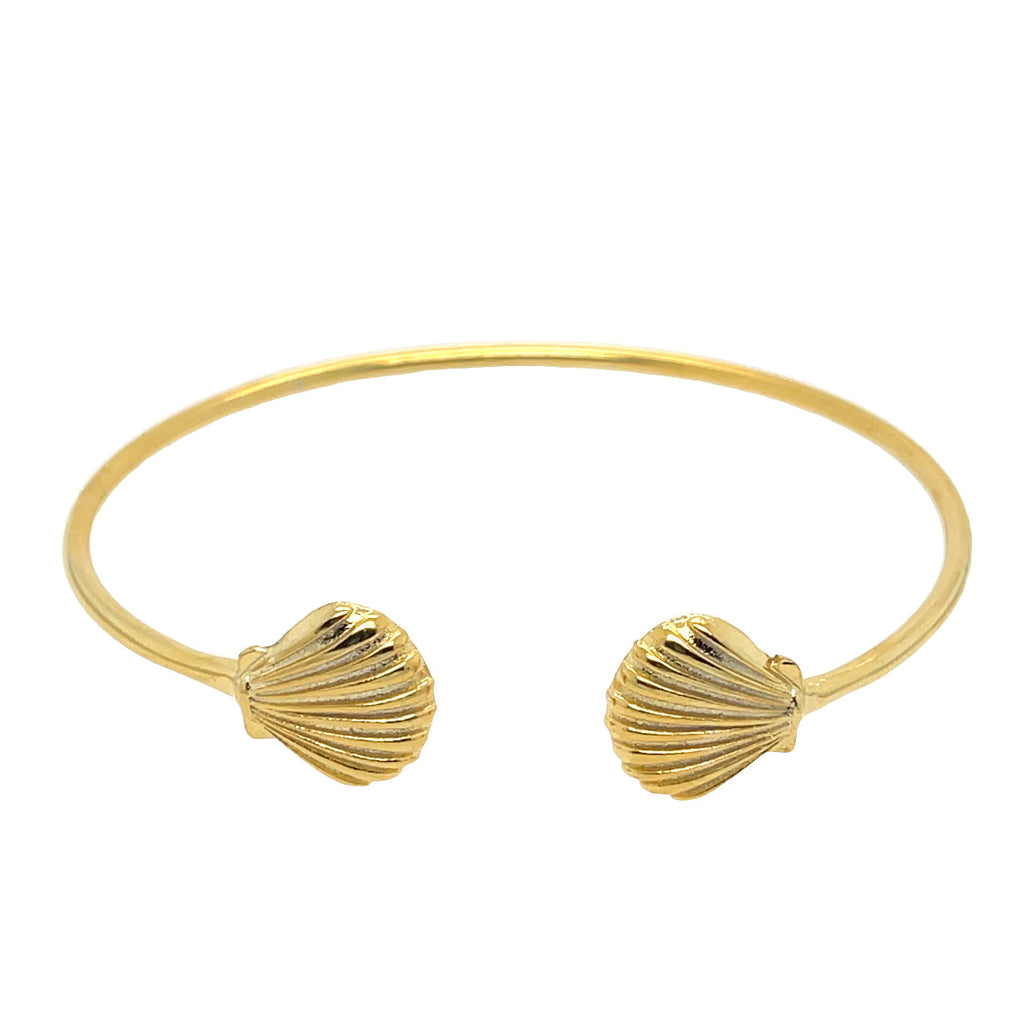 <p>Gold plated bangle with a shell on each end
