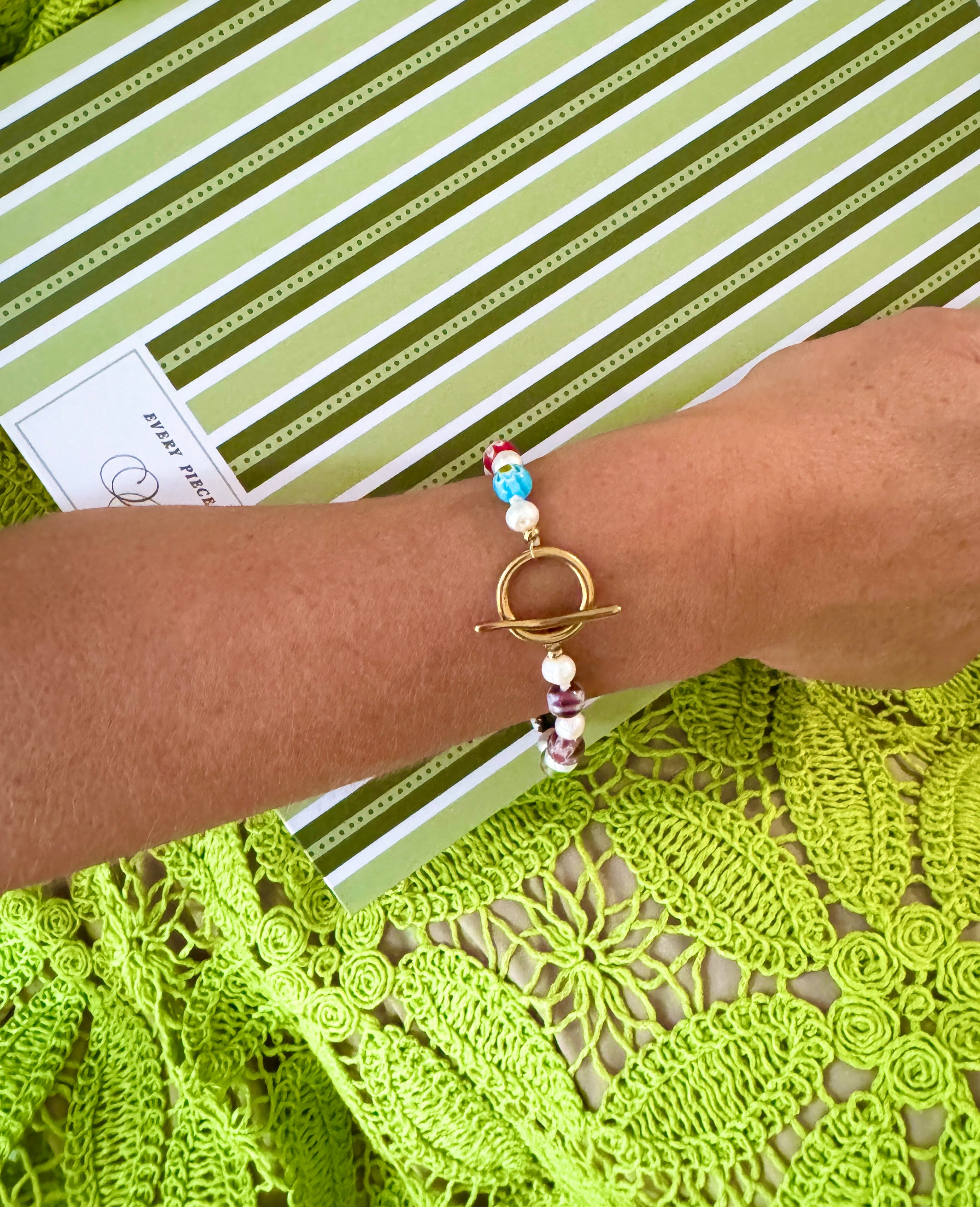 This new unique piece features European-style beads mixed with marvelous pearls. The unique clasp offers an alternative option to a traditional clasp.&nbsp;