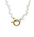 Pearl necklace with gold clasp on white background.
