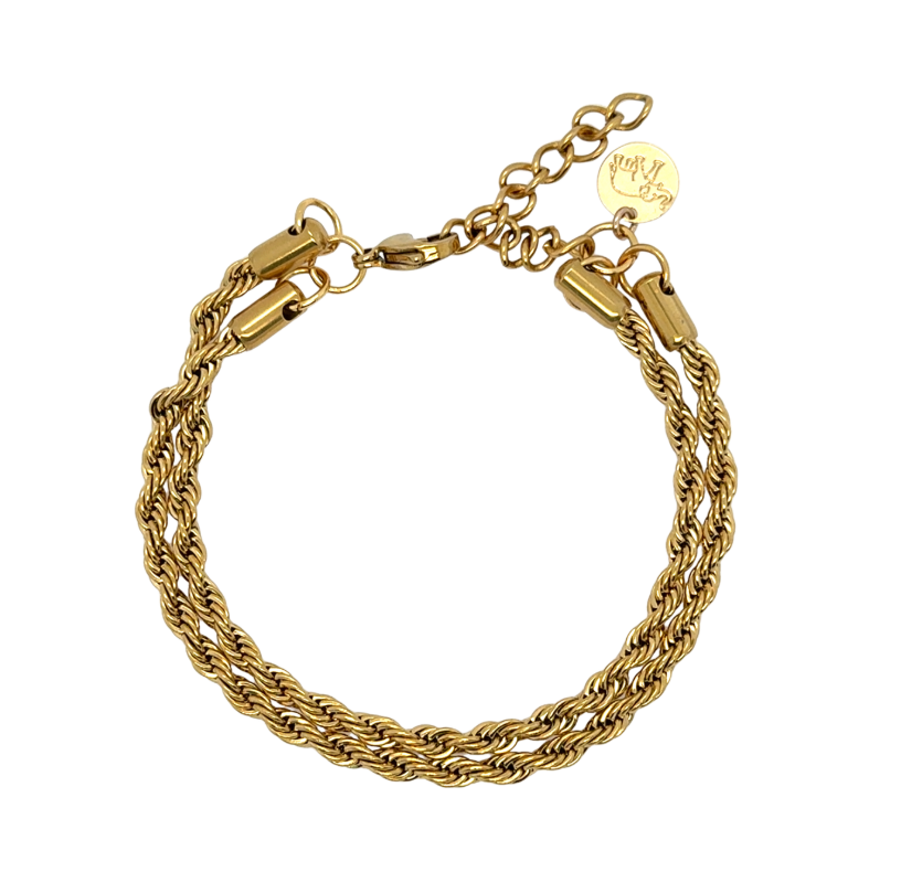 A gold-toned multi-strand rope chain bracelet with a lobster clasp and extension chain featuring a round brand tag, shown on a plain white background.