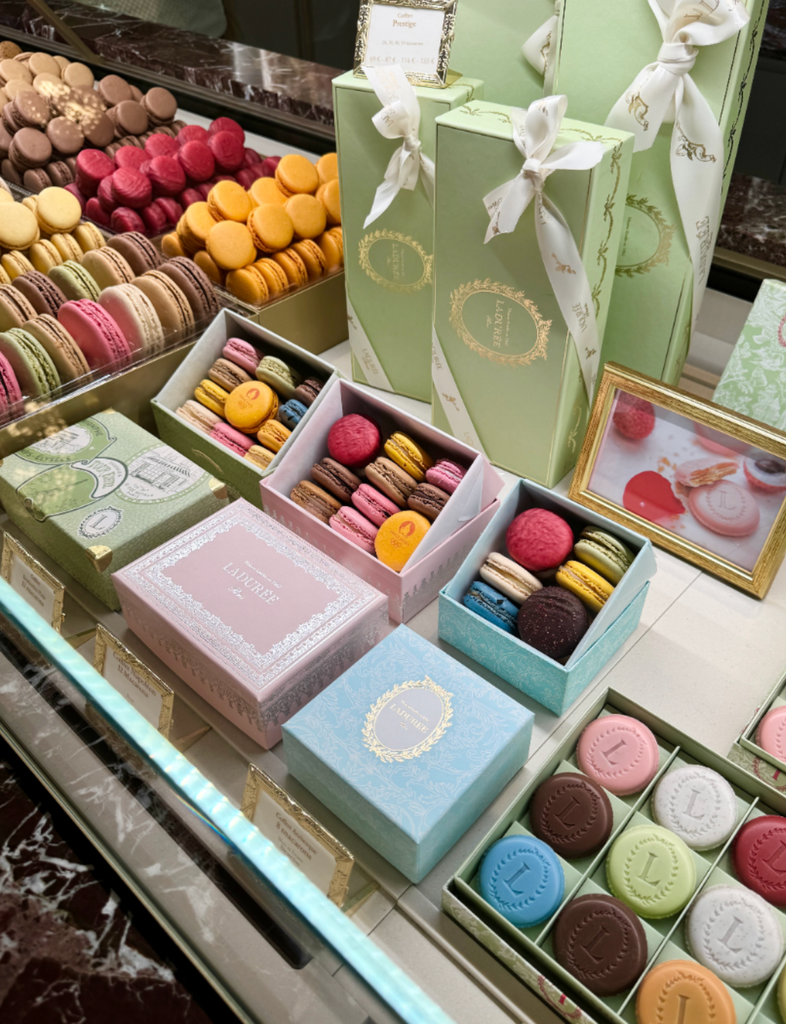 Indulge in world-famous macarons at Ladurée, the epitome of Parisian patisserie elegance.