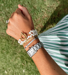 Lena is the golden twin to Luna. This simple gold bracelet is perfect for creating a beautiful stack of bracelets or for creating a simple dainty look by wearing it alone.&nbsp;