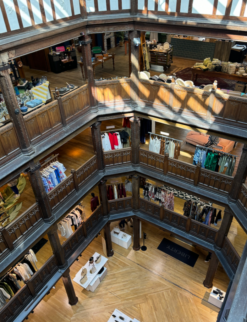 Step into Liberty London, a Tudor-style shopping haven blending fashion, beauty, and British design.