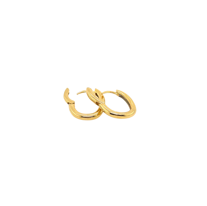 Gold hoop earrings on a white background