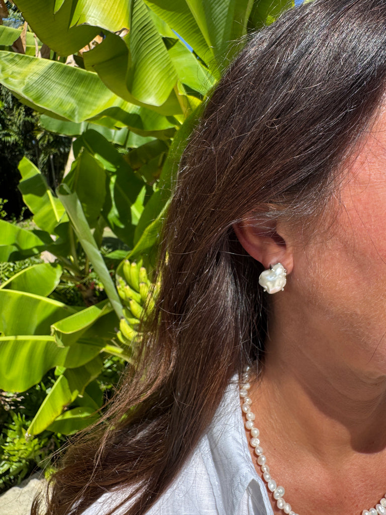 Sleek and effortlessly cool, this stainless steel silver earring set brings modern minimalism to your jewelry collection. Crafted for durability and shine, each piece features clean lines and a high-polish finish that complements any style — from casual denim to evening glam.