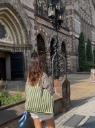 Our signature green striped canvas tote is here.