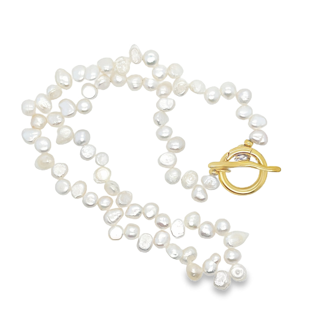 Classic 18-inch pearl necklace featuring lustrous, hand-selected pearls for a timeless look.
Elegant accessory perfect for weddings, formal events, or everyday sophistication.