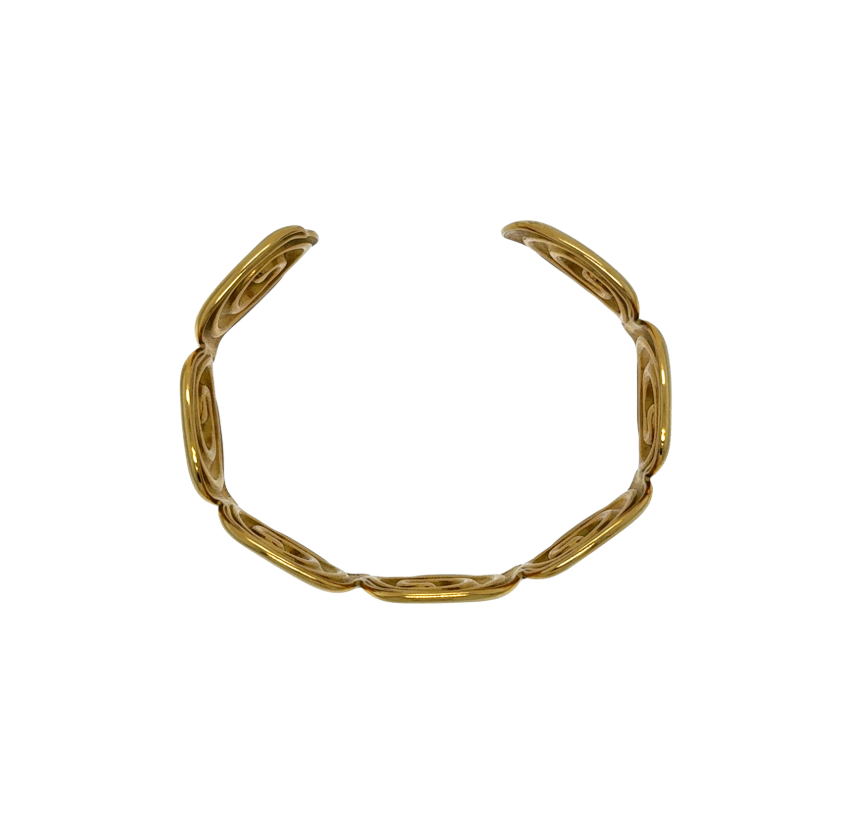 Gold bracelet on a white background