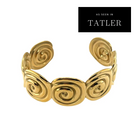 Marilla Gold Bracelet – gold finished cuff bracelet with a Grecian swirl design, as seen in Tatler