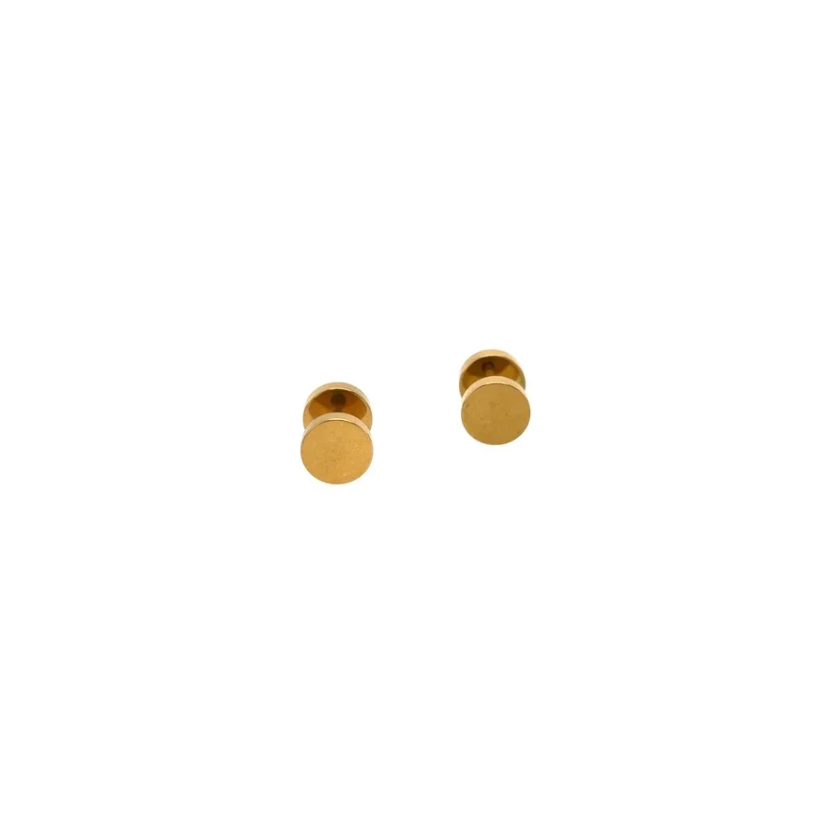 Pair of gold stud earrings on a white background