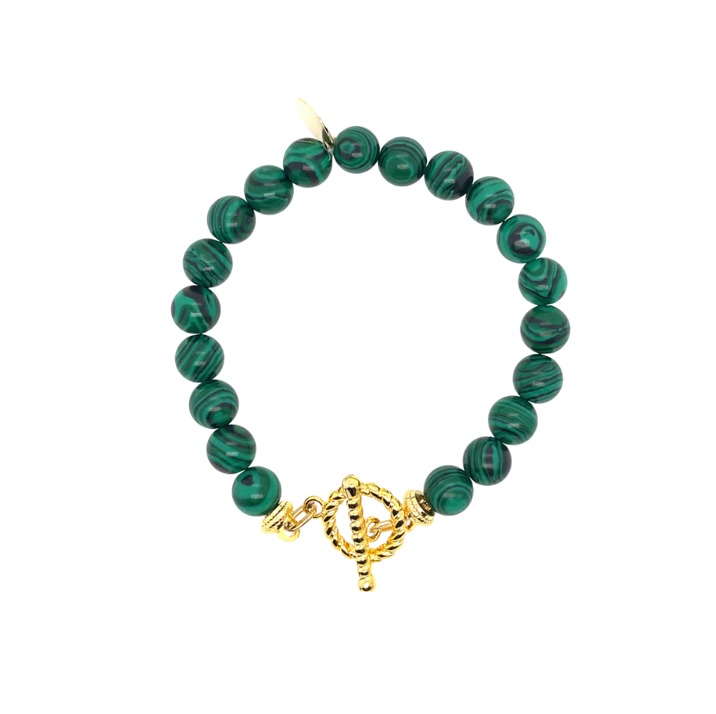 Green beaded bracelet with a gold clasp on a white background