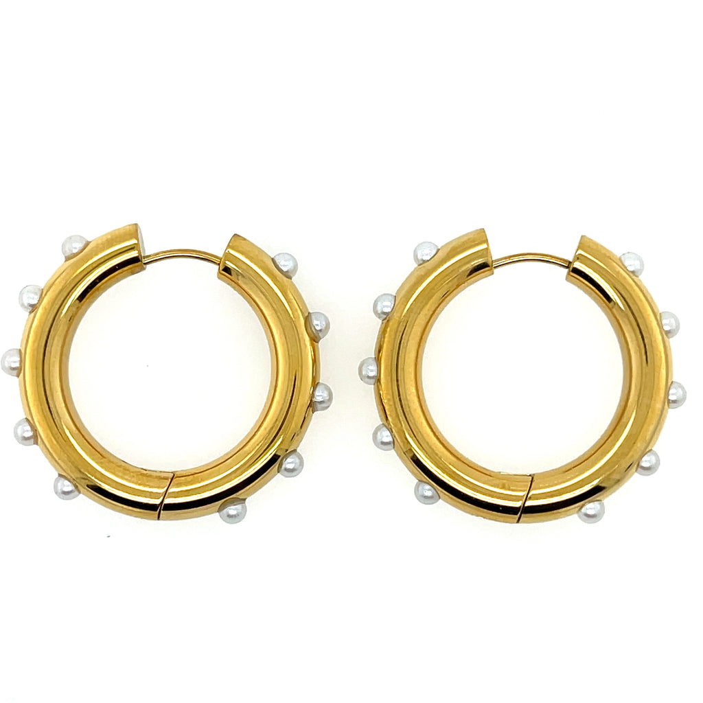Gold plated stainless steel hoop earrings, 1 inch x 1 inch, accented with elegant white pearls.
Timeless and tarnish-resistant—perfect for daily wear, formal events, or bridal accessories.