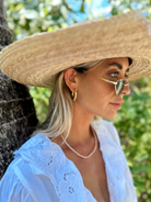 1x1 inch gold plated hoop earrings crafted from stainless steel with smooth, luminous pearl drops.
Modern elegance meets classic charm—ideal for work, date nights, or special occasions.