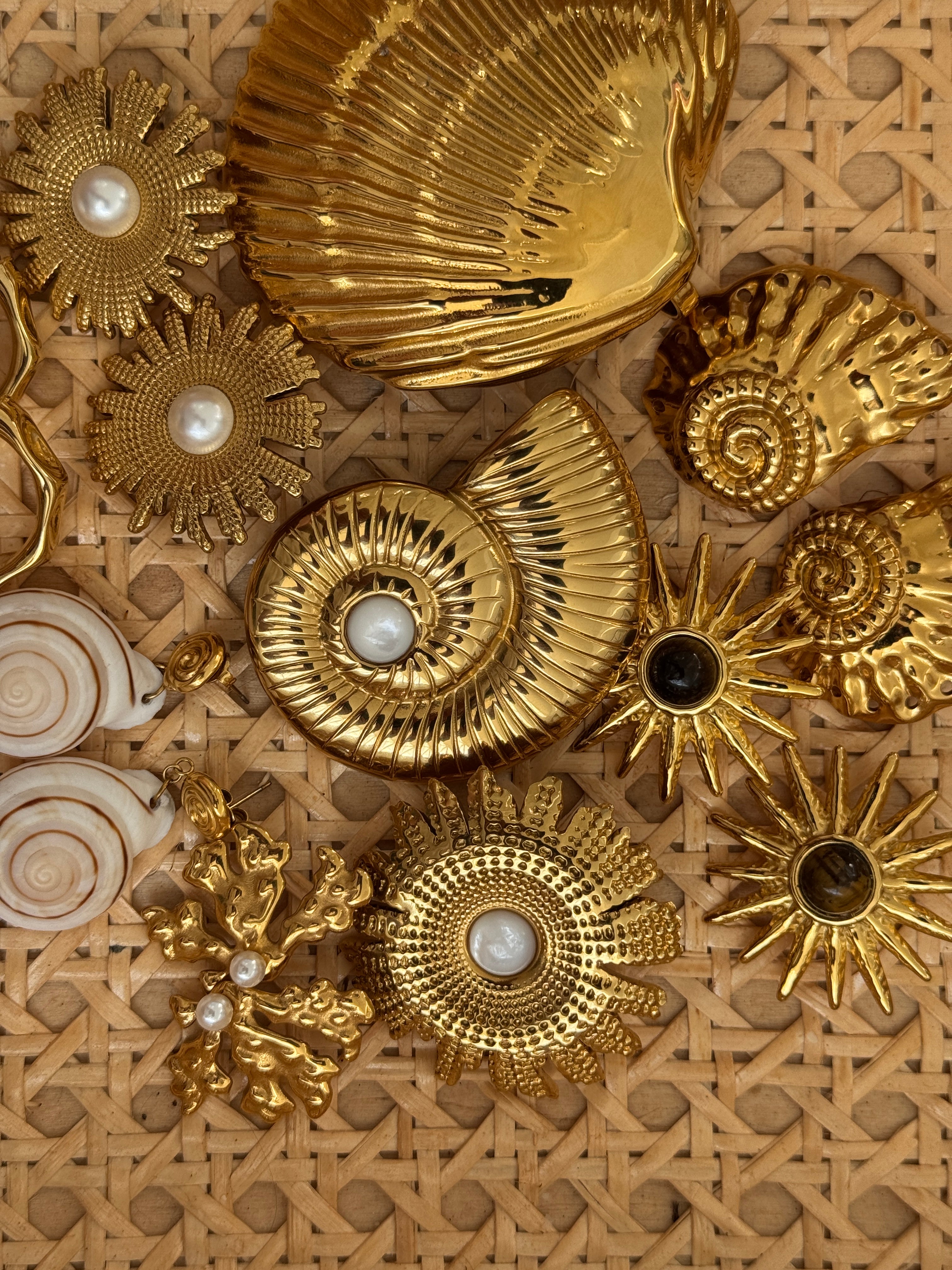 Gold jewelry from the Love, Ellison Resort Collection