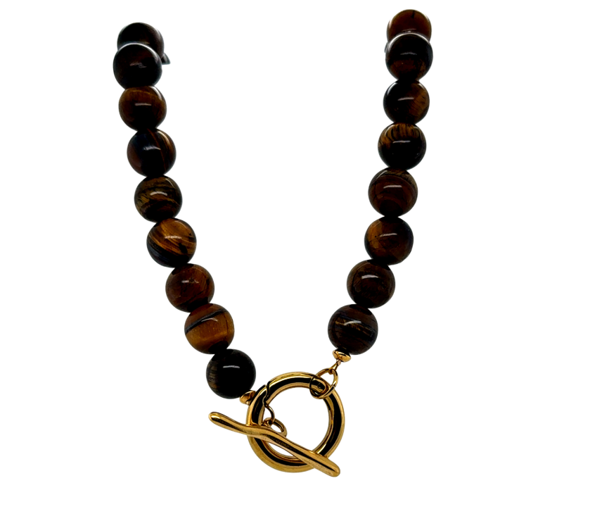Bracelet with tiger eye beads and a gold clasp on a white background