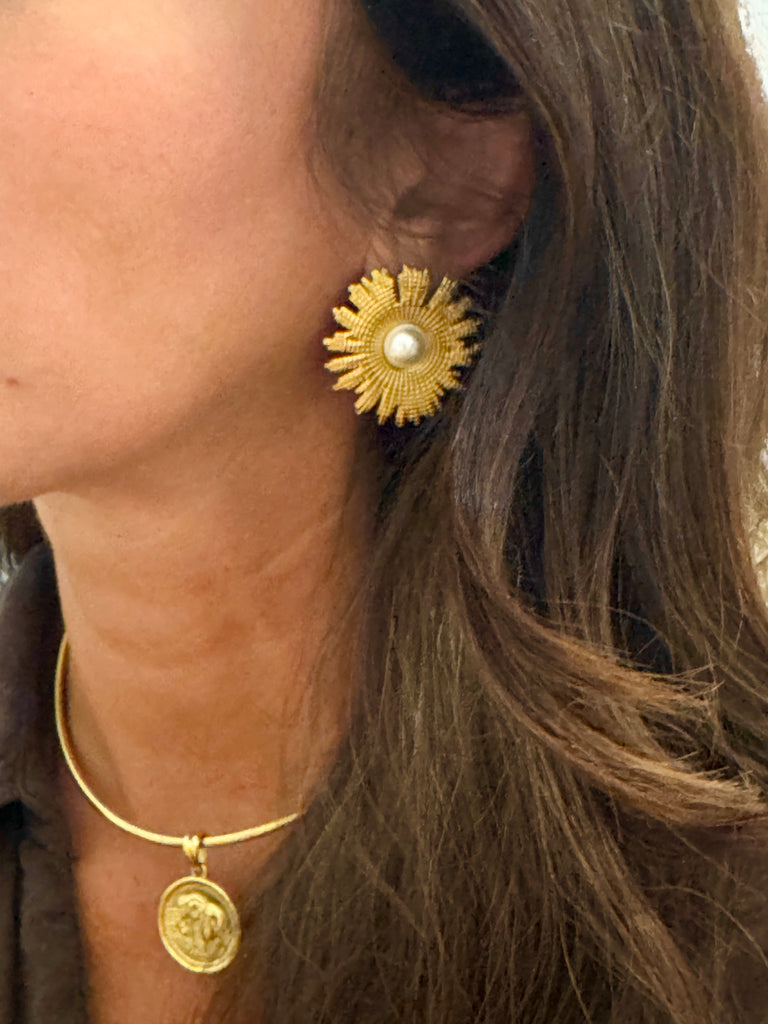 Introducing Saffron, a pair of gold-plated stainless steel earrings centered with luminous pearls and designed for enduring sophistication. At 1.5 inches wide, these earrings make a graceful statement without overpowering your look. Named after the world’s most luxurious spice, Saffron symbolizes rarity, elegance, and refined beauty — just like you.