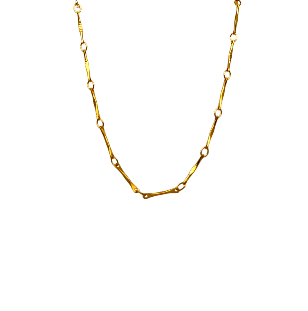 Gold necklace on a white background