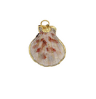 Shell pendant with gold edge on a white background