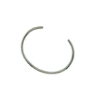 The Simply Silver Bangle is the epitome of understated elegance, designed to complement any style with its clean lines and timeless appeal. This sleek and minimalistic bangle offers a refined, modern look that's perfect for everyday wear or special occasions. Its smooth, polished surface catches the light with every movement, creating a subtle yet sophisticated shine.