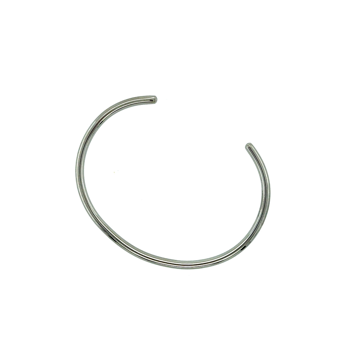 The Simply Silver Bangle is the epitome of understated elegance, designed to complement any style with its clean lines and timeless appeal. This sleek and minimalistic bangle offers a refined, modern look that's perfect for everyday wear or special occasions. Its smooth, polished surface catches the light with every movement, creating a subtle yet sophisticated shine.