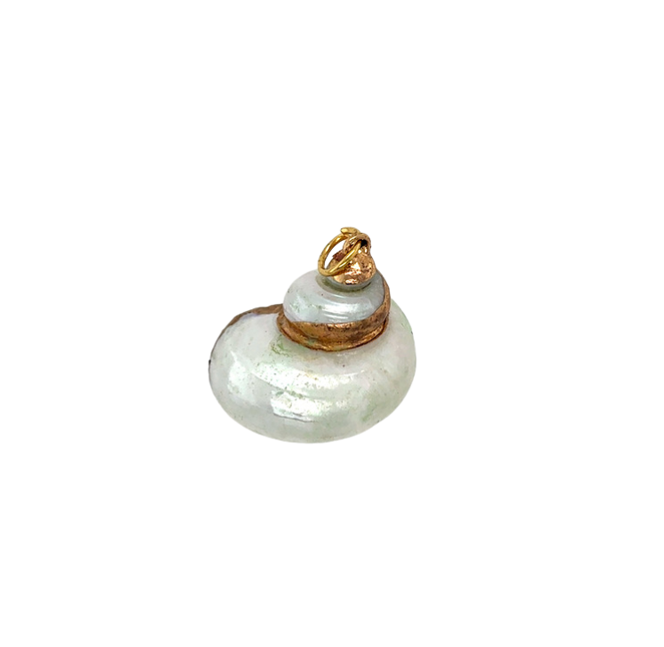 Pearl pendant with gold accents on a white background