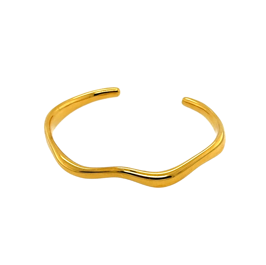 The Gold Wave Bangle is a fluid expression of elegance, inspired by the graceful movement of water.