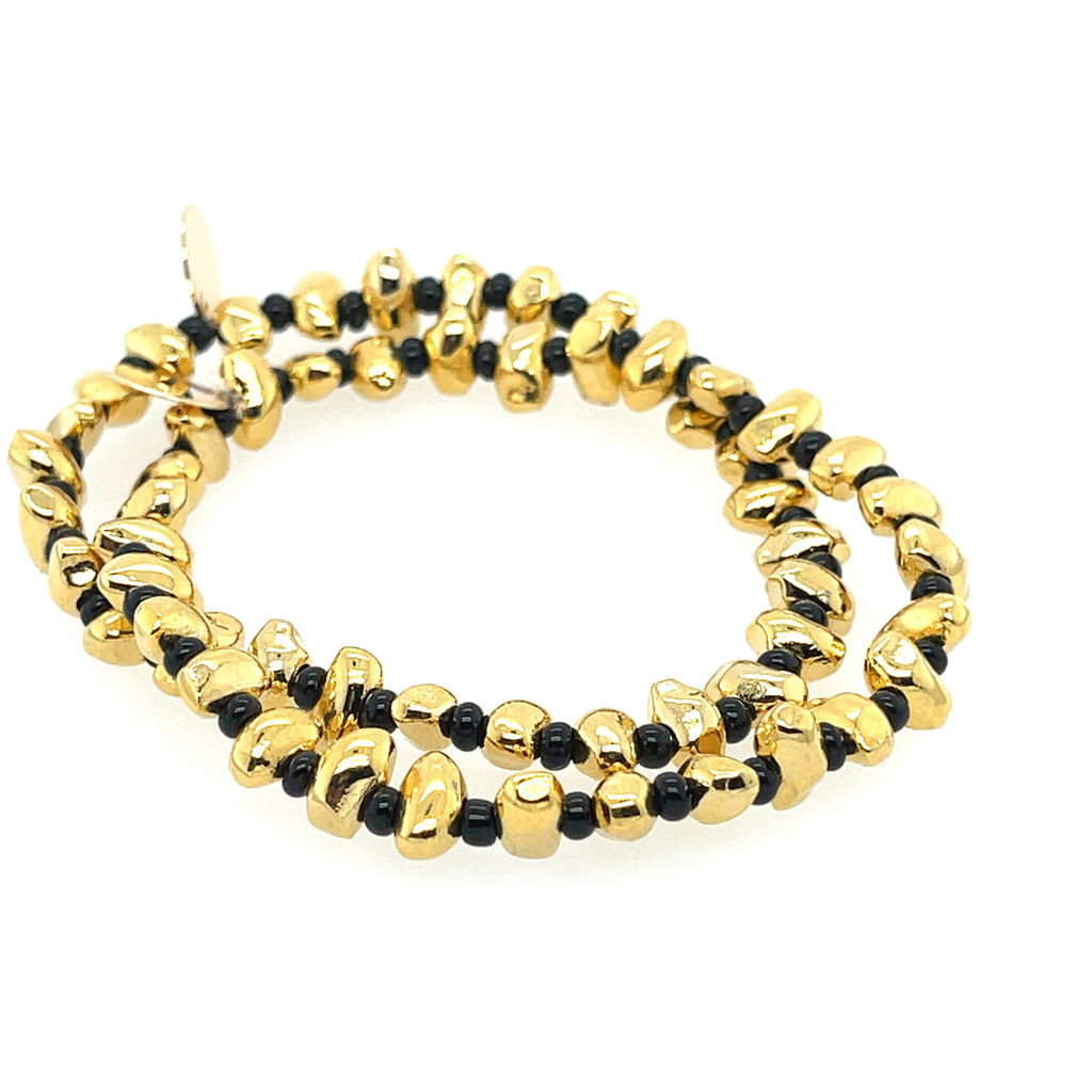 Set of gold plated and black bead bracelets, 3 inch diameter with 0.25 inch beads, elegant stackable wristwear